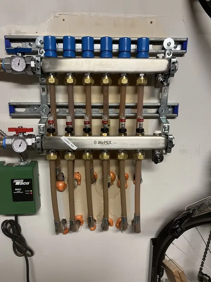 Plumber performing Water Heater Repair at a residential property in Los Lunas